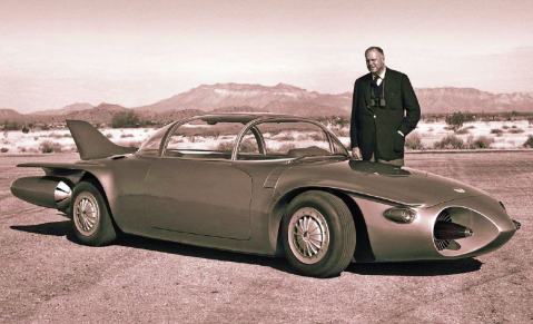 Harley Earl poses with the Firebird II concept